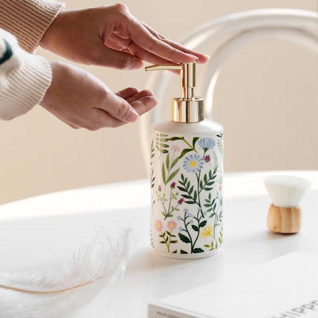 Naya Vault | Soap dispenser made of ceramic with floral design